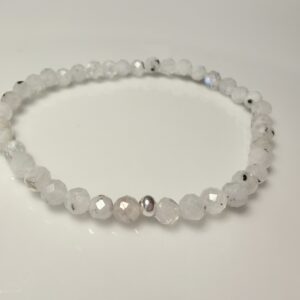 PIEDRA LUNA MANCHAS NEGRAS FACETADA